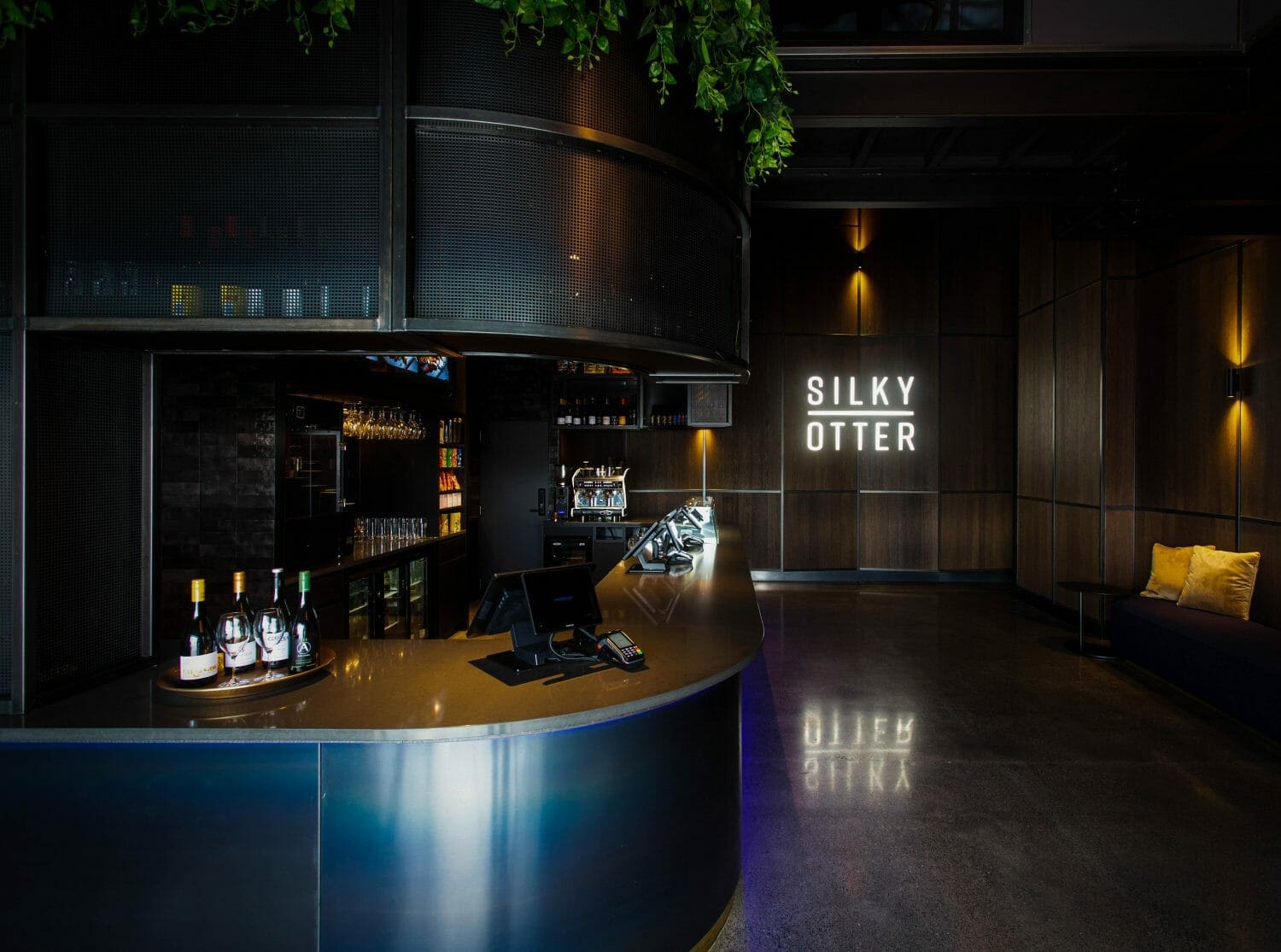 Interior design of Silky Otter Cinema, showcasing branded aesthetics and immersive ambiance.