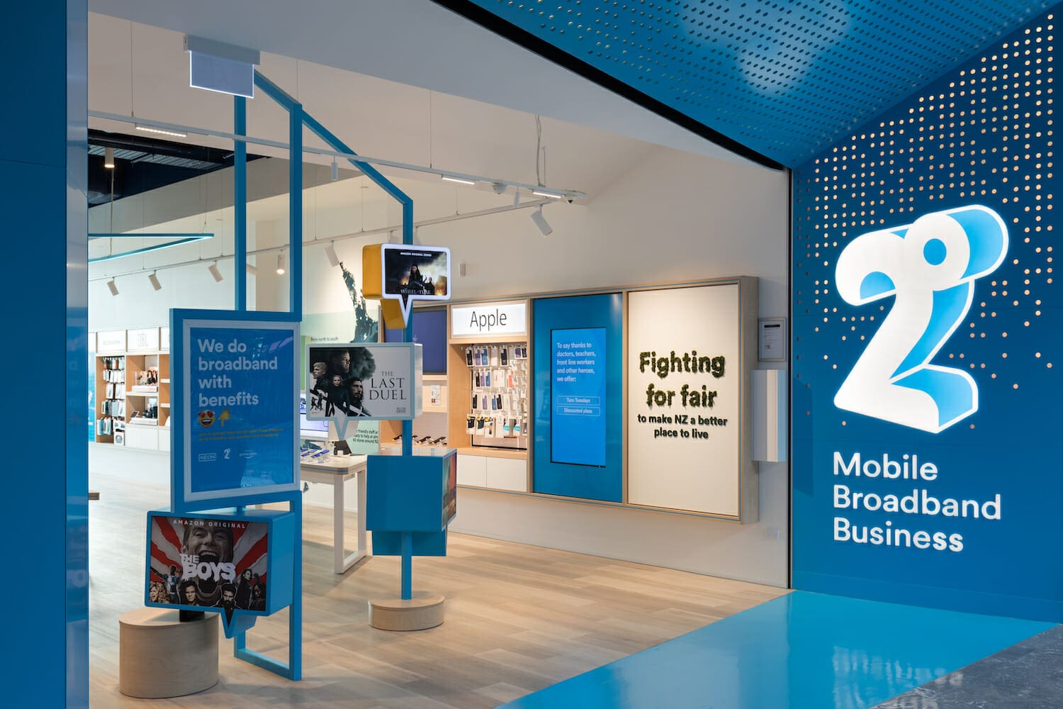 2degrees flagship store entrance with blue entry portal and dynamic lighting, designed by Spaceworks.