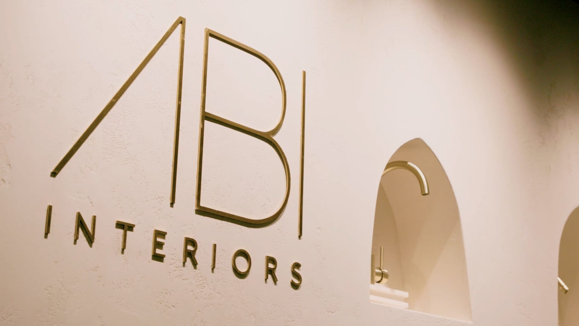 ABI Showroom Design in Auckland, created by Spaceworks, featuring warm tones, luxury materials, and an inviting customer experience.