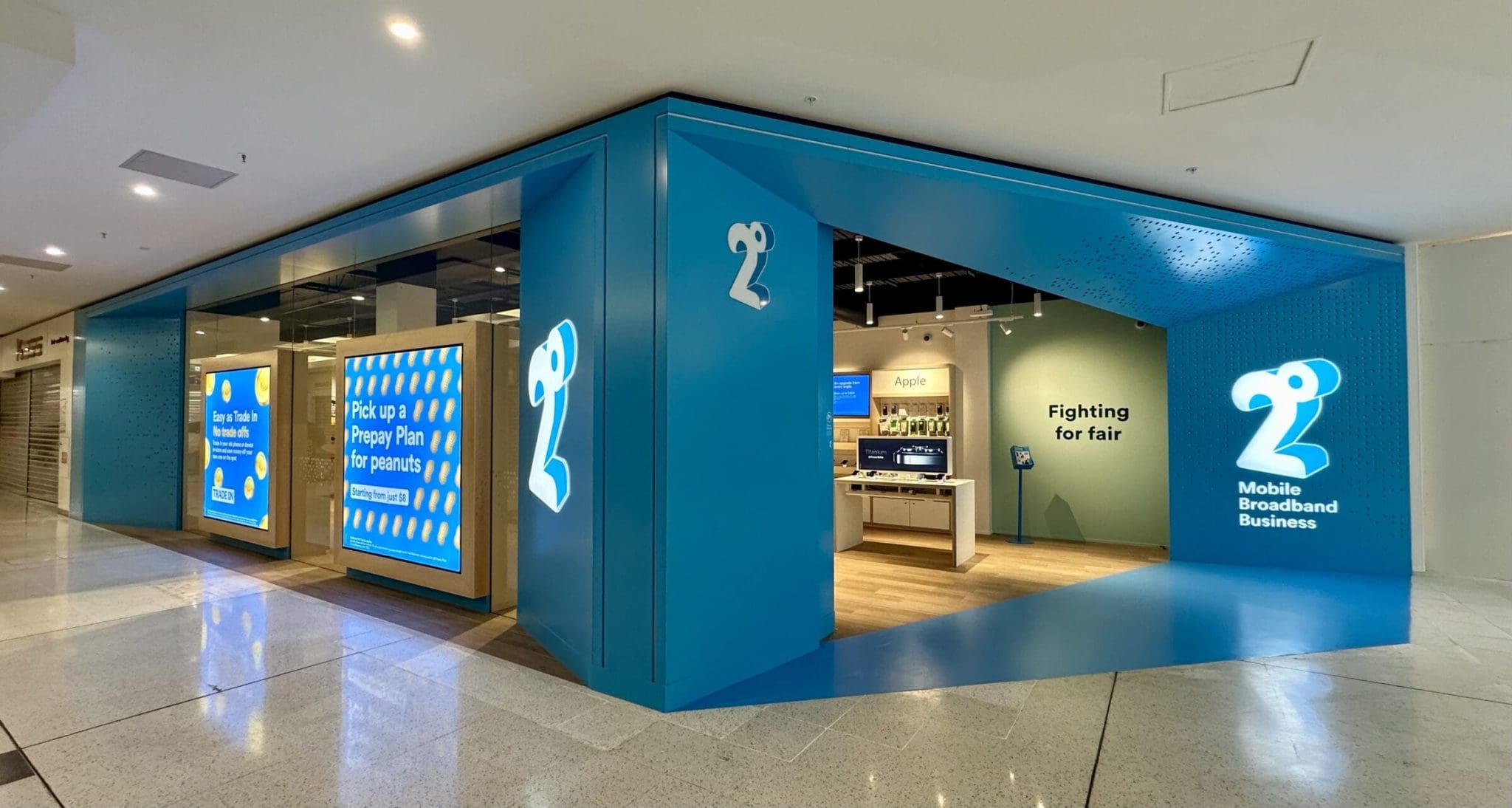 2degrees kiosk at Westfield St Lukes, designed by Spaceworks, featuring a sleek, modern retail fit-out with bold branding.